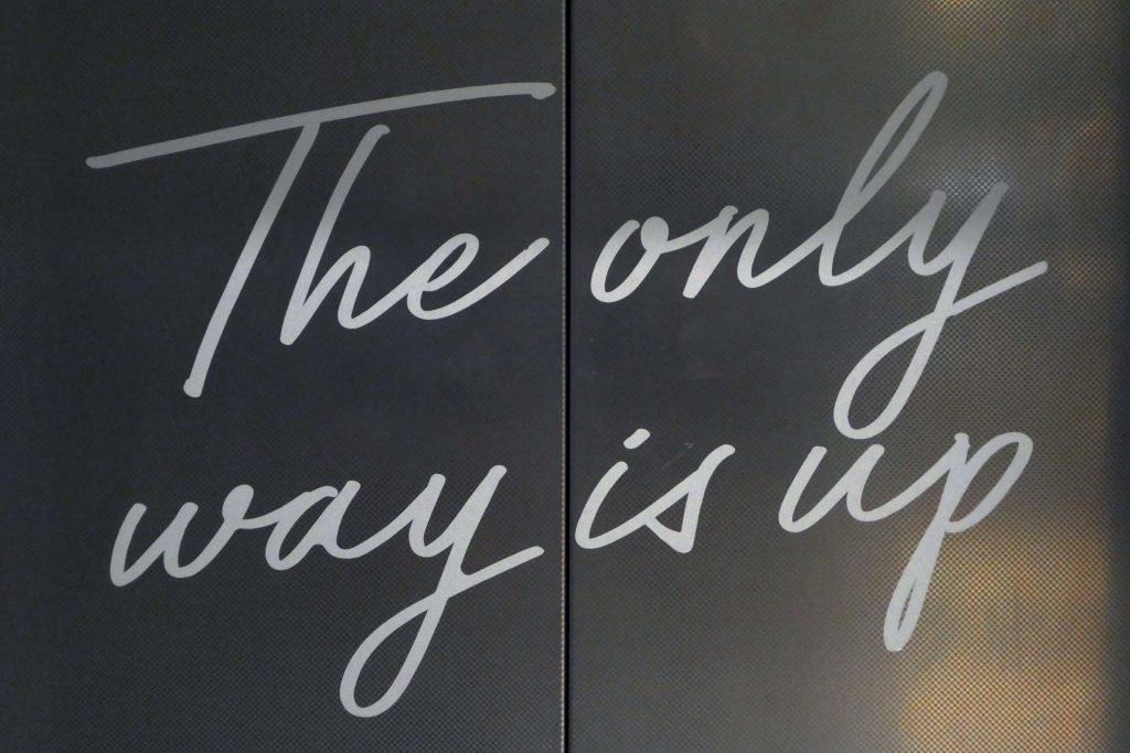 Chalkboard saying the only way is up